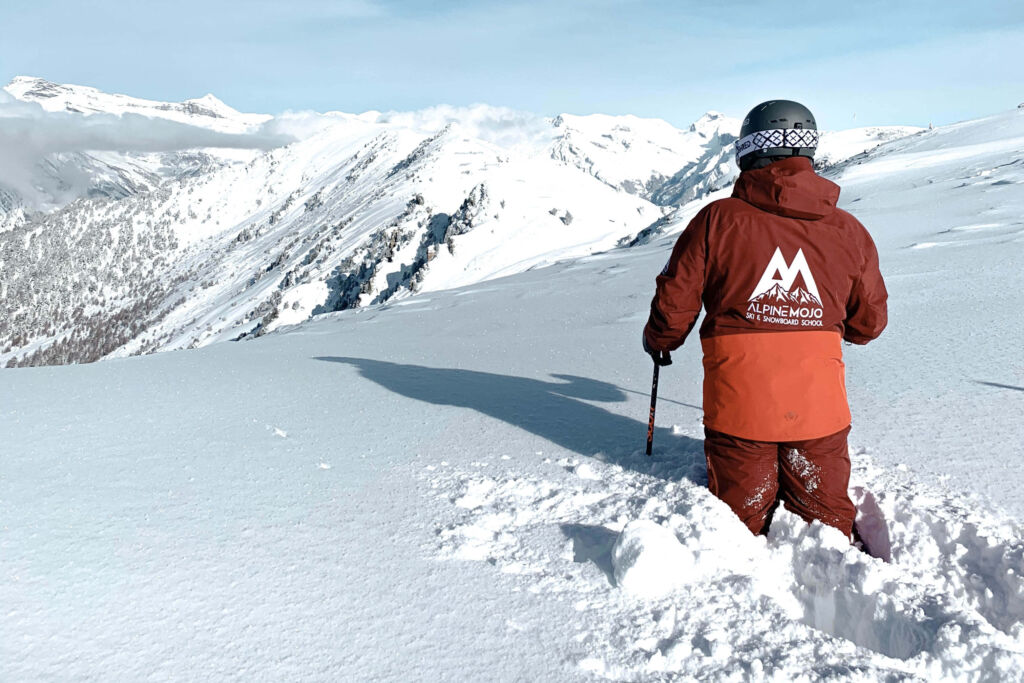 AlpineMojo ski instructor in fresh powder in Verbier
